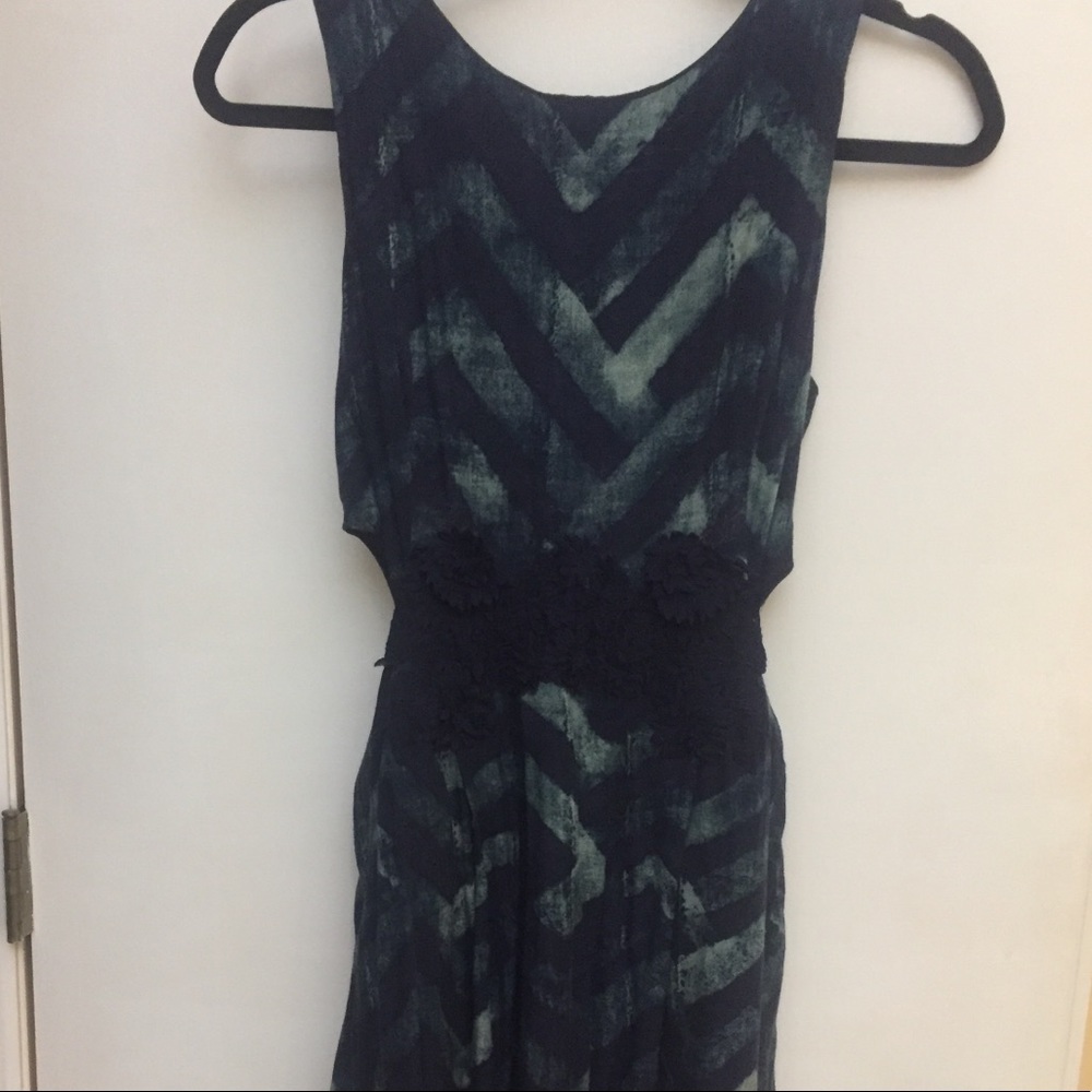 Mini dress with side cut outs and pockets